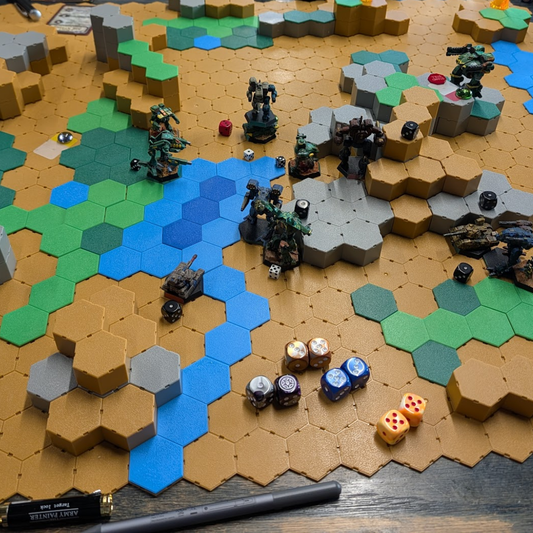 Modular hex terrain battlefield set up for BattleTech tabletop gameplay